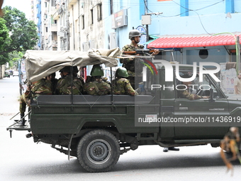 The Bangladesh Army is patrolling the street as authorities are easing the curfew, which came into effect after student protests against the...