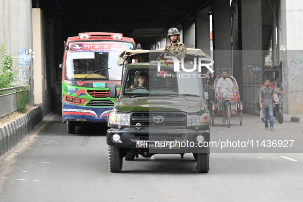 Bangladesh Army Patrol On Street As Authorities Have Eased The Curfew, Which Came Into Effect After Student Protests Against Quota System Fo...