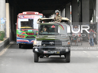 Bangladesh Army Patrol On Street As Authorities Have Eased The Curfew, Which Came Into Effect After Student Protests Against Quota System Fo...