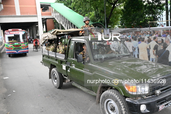 Bangladesh Army Patrol On Street As Authorities Have Eased The Curfew, Which Came Into Effect After Student Protests Against Quota System Fo...