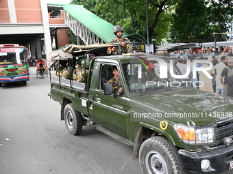 Bangladesh Army Patrol On Street As Authorities Have Eased The Curfew, Which Came Into Effect After Student Protests Against Quota System Fo...