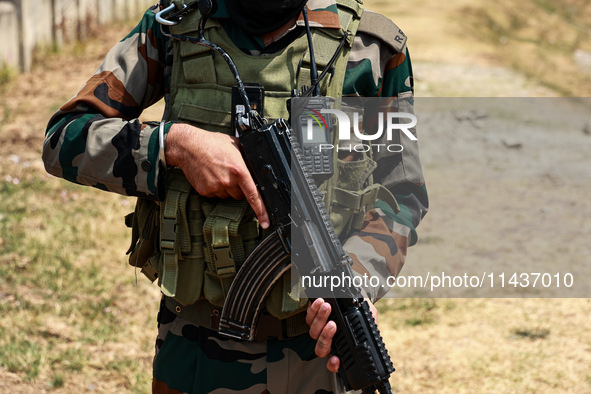 Indian Army soldiers are patrolling with AK-47 weapons in Baramulla, Jammu and Kashmir, India, on July 27, 2024. Five Indian Army soldiers,...