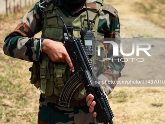 Indian Army soldiers are patrolling with AK-47 weapons in Baramulla, Jammu and Kashmir, India, on July 27, 2024. Five Indian Army soldiers,...