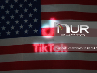 An American flag and TikTok are being displayed in Shanghai, China, on July 27, 2024. (