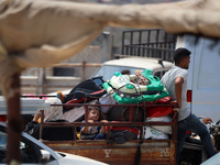 Palestinians are fleeing the eastern part of Khan Younis as they make their way after being ordered by the Israeli army to evacuate their ne...