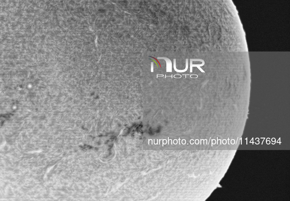 (EDITOR'S NOTE: This image was captured with an H-Alpha solar telescope and is the result of stacking the best 20% of frames. The final stac...