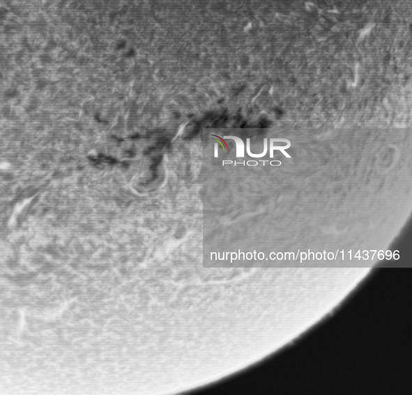 (EDITOR'S NOTE: This image was captured with an H-Alpha solar telescope and is the result of stacking the best 20% of frames. The final stac...