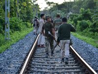 Forest officials are keeping vigil after a Royal Bengal tiger is being spotted by local villagers near a jute paddy field in Dhing, Nagaon D...