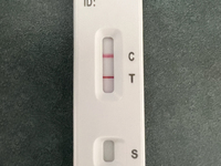 A positive COVID-19 rapid test is being shown at a doctor's office in Toronto, Ontario, Canada, on July 23, 2024. COVID-19 numbers are spiki...