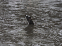 A drain is flooding on Avenida Tlahuac in Mexico City after flooding is reported in various areas of the capital. (