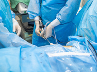 A doctor is performing laparoscopic lithotomy on a patient at the Second People's Hospital of Jinsha County in Bijie, China, on July 17, 202...