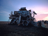 A combine is sparking a devastating fire in a wheat field in Orangeville, IL, rapidly spreading and engulfing a significant portion of the c...