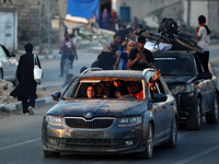 Displaced Palestinians are leaving al-Bureij refugee camp towards the west, after the Israeli army issued a new evacuation order, in the cen...