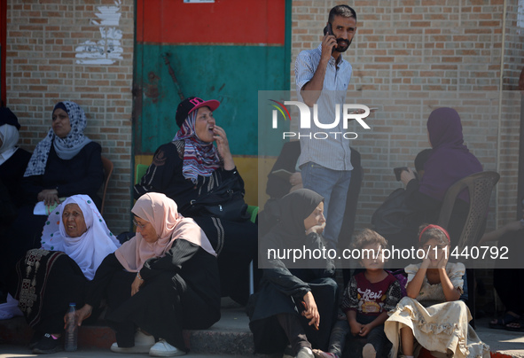 A group of Palestinian children and patients are awaiting in Deir Al-Balah, central Gaza Strip, on July 28, 2024, for their medical evacuati...