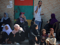 A group of Palestinian children and patients are awaiting in Deir Al-Balah, central Gaza Strip, on July 28, 2024, for their medical evacuati...