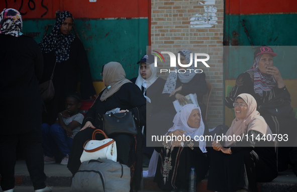 A group of Palestinian children and patients are awaiting in Deir Al-Balah, central Gaza Strip, on July 28, 2024, for their medical evacuati...