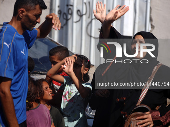 A group of Palestinian children and patients are awaiting in Deir Al-Balah, central Gaza Strip, on July 28, 2024, for their medical evacuati...