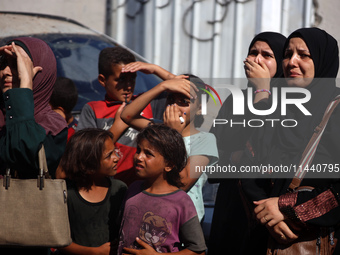 A group of Palestinian children and patients are awaiting in Deir Al-Balah, central Gaza Strip, on July 28, 2024, for their medical evacuati...