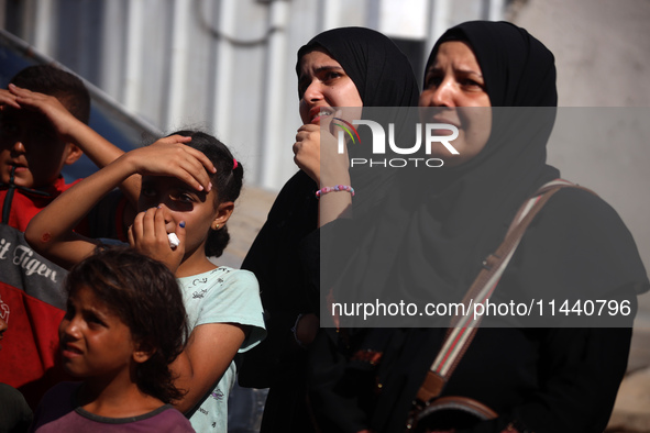 A group of Palestinian children and patients are awaiting in Deir Al-Balah, central Gaza Strip, on July 28, 2024, for their medical evacuati...