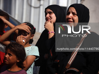 A group of Palestinian children and patients are awaiting in Deir Al-Balah, central Gaza Strip, on July 28, 2024, for their medical evacuati...