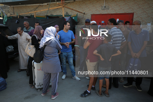 A group of Palestinian children and patients are awaiting in Deir Al-Balah, central Gaza Strip, on July 28, 2024, for their medical evacuati...