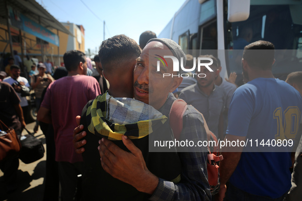 A group of Palestinian children and patients are awaiting in Deir Al-Balah, central Gaza Strip, on July 28, 2024, for their medical evacuati...