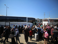 A group of Palestinian children and patients are awaiting in Deir Al-Balah, central Gaza Strip, on July 28, 2024, for their medical evacuati...