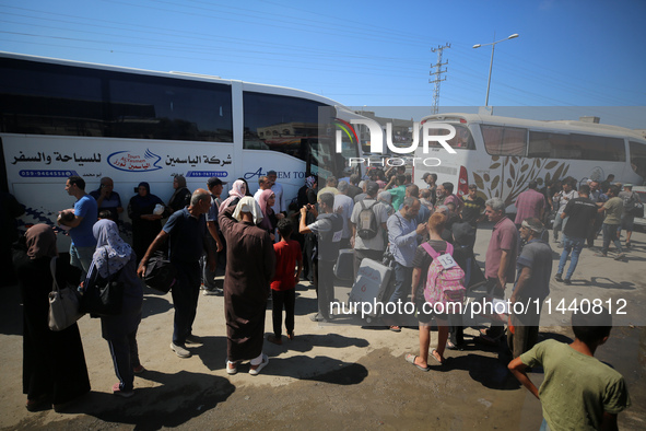 A group of Palestinian children and patients are awaiting in Deir Al-Balah, central Gaza Strip, on July 28, 2024, for their medical evacuati...