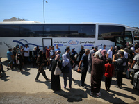 A group of Palestinian children and patients are awaiting in Deir Al-Balah, central Gaza Strip, on July 28, 2024, for their medical evacuati...