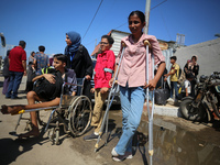 A group of Palestinian children and patients are awaiting in Deir Al-Balah, central Gaza Strip, on July 28, 2024, for their medical evacuati...