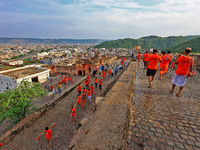 Kanwariyas are carrying holy water from the shrine 'Galta Peeth Tirtha' and going back to their pilgrimage in the auspicious month of 'Sharv...