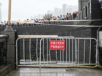 Citizens are watching the rising water at the Toudao wharf in Jilin City, Jilin province, China, on July 28, 2024. (