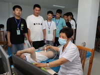 Young conscripts are attending a physical examination at a conscription medical examination station in Funing county, Yancheng city, East Ch...