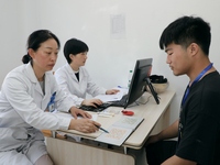 Young conscripts are attending a physical examination at a conscription medical examination station in Funing county, Yancheng city, East Ch...