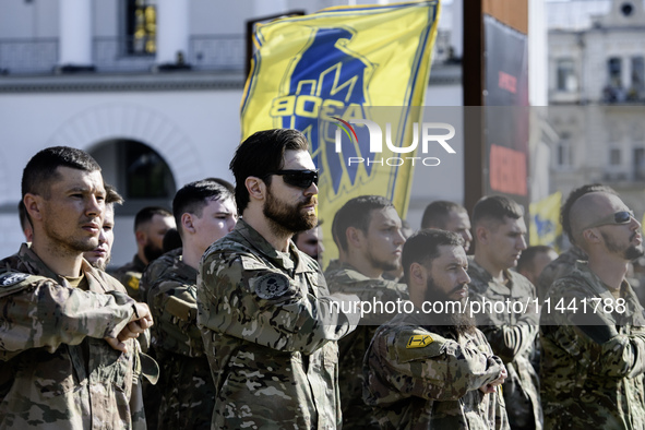 Servicemen of the Azov battalion are attending a ceremony to remember the victims of the Olenivka camp explosion, in Kyiv, Ukraine, on July...