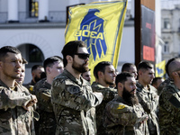 Servicemen of the Azov battalion are attending a ceremony to remember the victims of the Olenivka camp explosion, in Kyiv, Ukraine, on July...