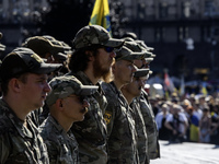 Servicemen of the Azov battalion are attending a ceremony to remember the victims of the Olenivka camp explosion, in Kyiv, Ukraine, on July...