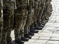 Servicemen of the Azov battalion are attending a ceremony to remember the victims of the Olenivka camp explosion, in Kyiv, Ukraine, on July...