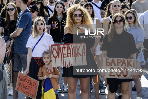 Ukrainian activists, relatives, and friends of soldiers who are defending the Azovstal Iron and Steel Works are holding placards calling on...