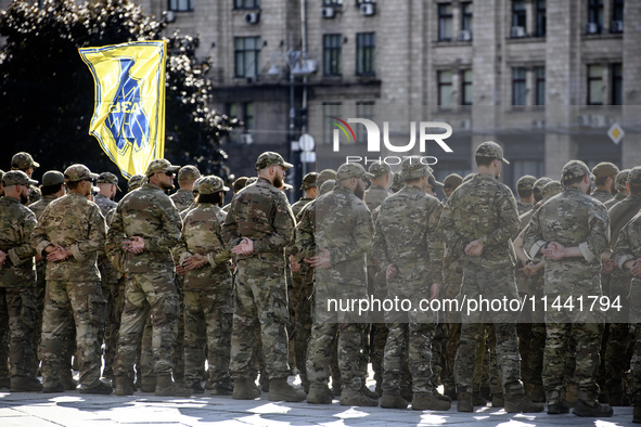 Servicemen of the Azov battalion are attending a ceremony to remember the victims of the Olenivka camp explosion, in Kyiv, Ukraine, on July...