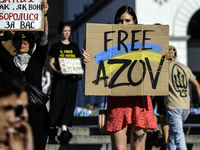 Ukrainian activists, relatives, and friends of soldiers who are defending the Azovstal Iron and Steel Works are holding placards calling on...