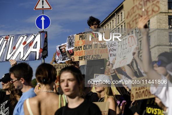 Ukrainian activists, relatives, and friends of soldiers who are defending the Azovstal Iron and Steel Works are holding placards calling on...