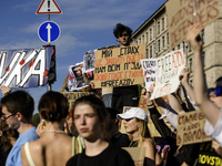 Ukrainian activists, relatives, and friends of soldiers who are defending the Azovstal Iron and Steel Works are holding placards calling on...