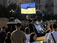 Ukrainian activists, relatives, and friends of soldiers who are defending the Azovstal Iron and Steel Works are holding placards calling on...