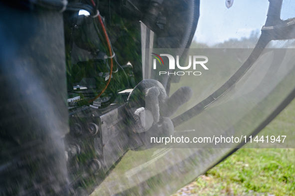 A soft toy is being seen through a window of a Mi-8MSB-V assault transport helicopter of the 16th Brody Separate Army Aviation Brigade in Uk...