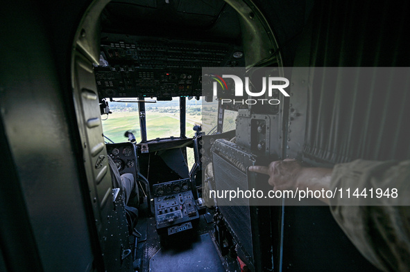 The cockpit is being pictured in a Mi-8MSB-V assault transport helicopter of the 16th Brody Separate Army Aviation Brigade in Ukraine, on Ju...