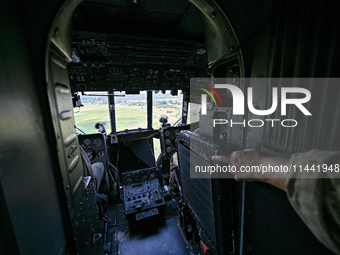 The cockpit is being pictured in a Mi-8MSB-V assault transport helicopter of the 16th Brody Separate Army Aviation Brigade in Ukraine, on Ju...