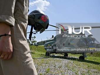 A Mi-8MSB-V assault transport helicopter of the 16th Brody Separate Army Aviation Brigade is in the field in Ukraine, on July 11, 2024. NO U...