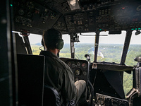 A 16th Brody Separate Army Aviation Brigade pilot is flying a Mi-8MSB-V assault transport helicopter in Ukraine, on July 11, 2024. NO USE RU...