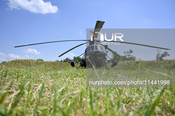 A Mi-8MSB-V assault transport helicopter of the 16th Brody Separate Army Aviation Brigade is in the field in Ukraine, on July 11, 2024. NO U...